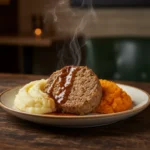 A close-up of a delicious plate of haggis with neeps and tatties, drizzled with whisky sauce in a cozy pub setting.